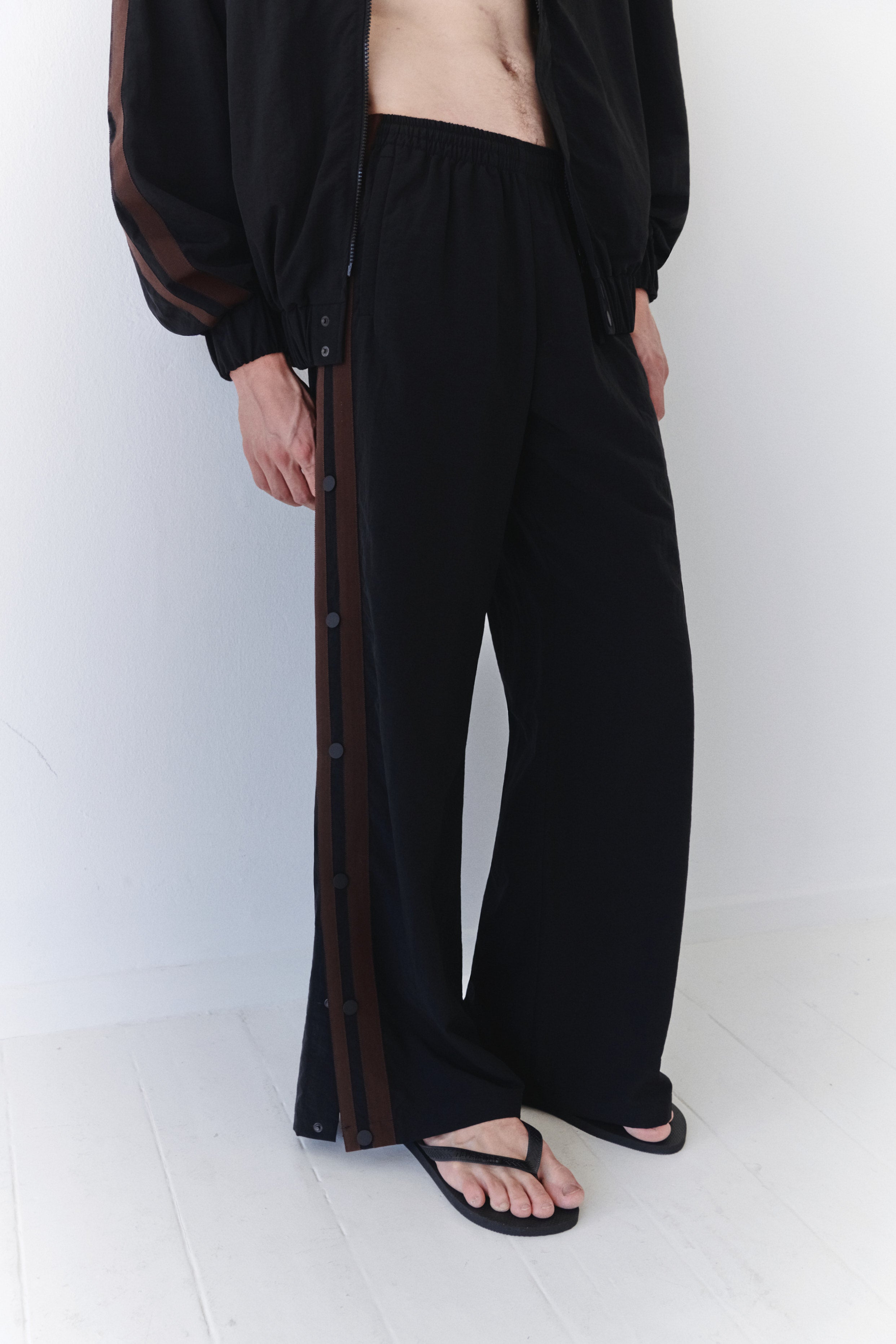 Water Resistant Black Parachute Track Pants With Brown Stripes