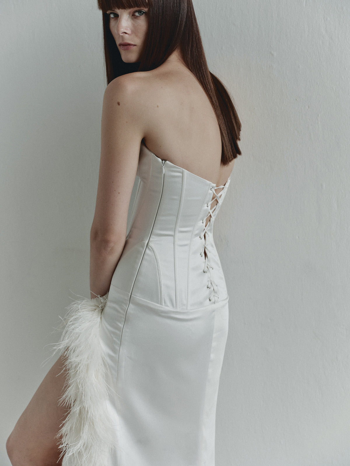 White Strapless Dress with Side Slit and Feather Trim